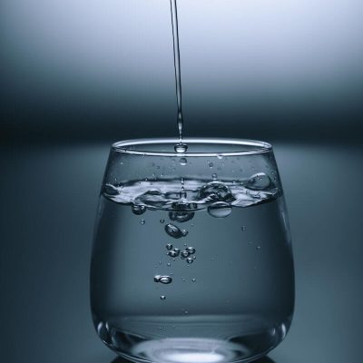 A Glass Of Water Representing M-Water